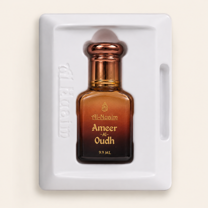Perfume bottle labeled 'Ameer Al Oudh' by Al Nuaim on a white tray with a beige background